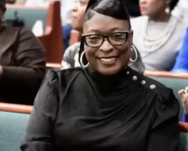 Apostle Zoe in black