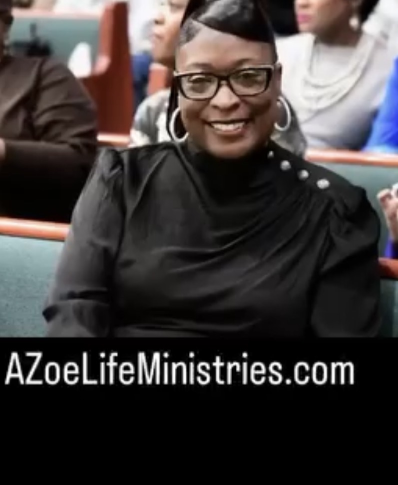 Apostle Zoe seated in ministry setting